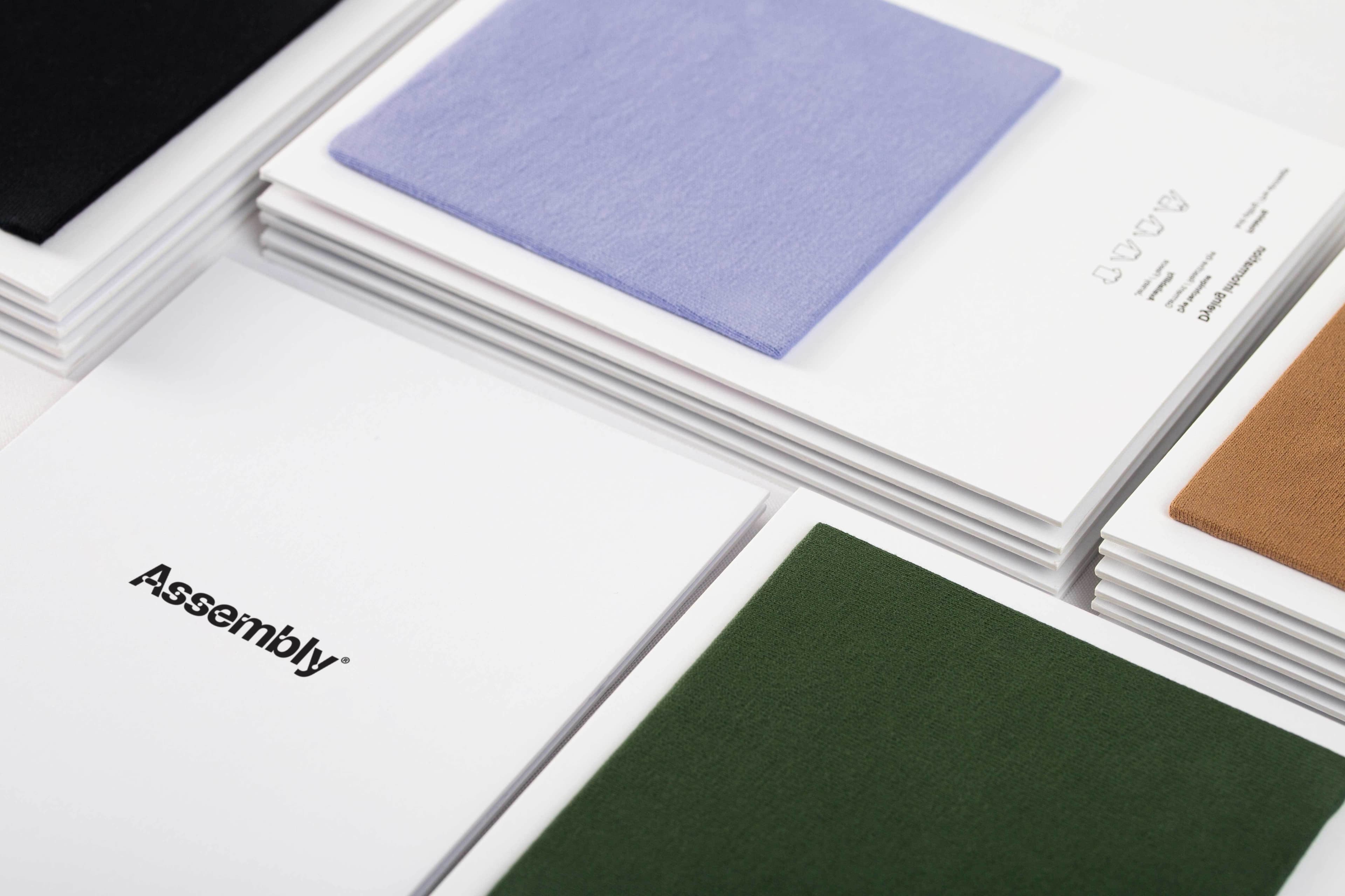 Fabric swatches showing Assembly’s custom merch materials in multiple colours